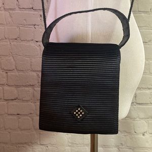 Black Evening Bag with Rhinestones with both hand and shoulder straps.